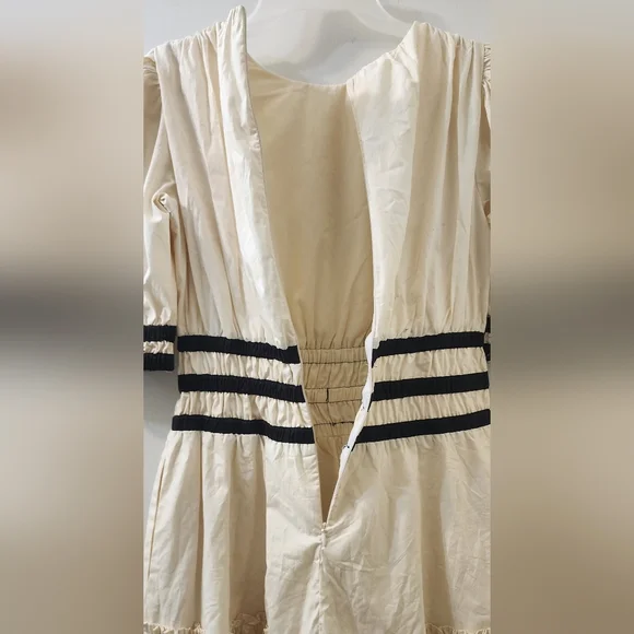 Aureum Elegant Cream Dress with Black Accents - Picture 10 of 11